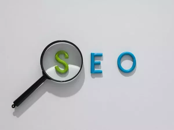 Search Engine Optimization SEO Service - Magnifying glass on SEO letters - Digi Brand Nova
